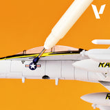 Model airplane with a propeller on an orange background