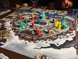 Board game with colorful game pieces on a map