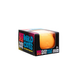 Orange fuzzy ball toy in a black box with colorful text on a white background