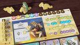 Board game with character cards and a player board on a wooden surface