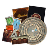 Collection of game components including cards and a spinner on a white background