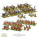 Collection of miniature figures from Caesar's Gallic Wars starter set by Warlord Games on a white background.