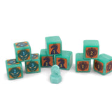Teal game dice with numbers and symbols on a white background