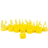 Multiple yellow plastic caps on a white background