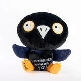 raven plush holding a black heart with text