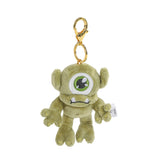 Plush monster keychain with a gold clip on a white background