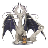 Dragon figurine with large wings on a white background