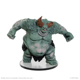 Green fantasy creature figurine on a white background