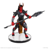 Figurine of a warrior with red and black armor holding a spear on a white background