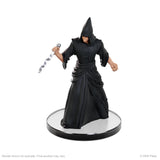 Figure in black robe with hood holding a sword on a white background