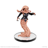 Figurine of a character with long hair and black outfit on a white background