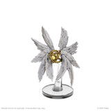 Decorative item with silver wings and a gold center on a white background