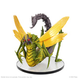 Detailed insect-like creature figurine with yellow wings and green body on a white background