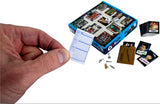 Board game components including cards, dice, and a box on a white background