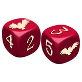 Two red dice with gold numbers and eagle designs on a white background