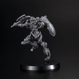 Mechanical figure on a black base against a black background