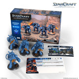 StarCraft tabletop miniatures game set with figures, cards, and box on a white background