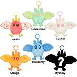 Set of colorful plush keychains labeled Apple, Honeydew, Lychee, Mango, Blueberry, and Mystery on a white background.