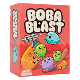 A boxed game called BOBA BLAST shown at a slight angle on a plain white background. The box is predominantly bright red with large white and black title lettering, plus colorful cartoon characters and text including 'TAKE AIM! FLIP YOUR BOBA! FILL THE CUP!'.