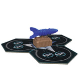 Toy spaceship on a hexagonal game board with star patterns
