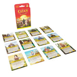 Settlers of Catan game cards on a white background
