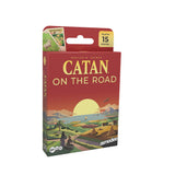 Catan On The Road game box with sunset design and 'asmodee' branding