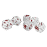 Set of silver polyhedral dice with red numbering and symbols on a white background