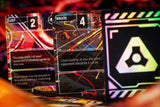Close-up of collectible card game cards with colorful abstract graphics and text such as 'LUST', 'WRATH', and game instructions, photographed in a dim, moody setting with blurred orange and black tones.