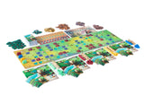 Board game with colorful tiles and pieces on a white background