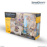 StarCraft tabletop miniature game box with Artanis and Pylon figures on a white background
