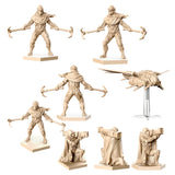 Set of beige figurines on a white background
