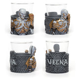 Set of four decorative glasses with warrior figurines and 'Veena' branding on a white background