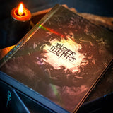 Book titled 'Elder Mythos' with a candle in the background