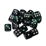 Set of black and green dice with white dots on a white background