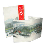 Set of cards with a scenic design and a red card with text on top, on a white background