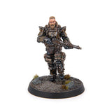 Miniature figure of a soldier in tactical gear with a weapon on a white background
