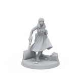 Unpainted miniature figurine of a character with a shovel on a white background