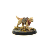 Model dog figure with gear and a bandana on a white background