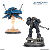 Two StarCraft miniatures on a white background, featuring a blue alien spacecraft and a human-like warrior with a gun.