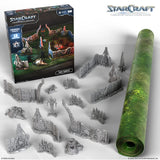 StarCraft tabletop miniature game set with box, terrain pieces, and mat on a white background