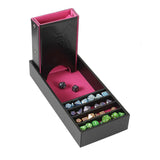 Black dice tray with pink interior holding various colorful dice