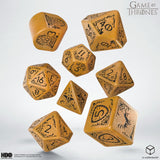 Set of Game of Thrones dice with intricate designs on a white background