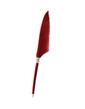 Red feather quill pen on a white background