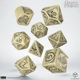 Set of Game of Thrones dice with gold and black design on a white background