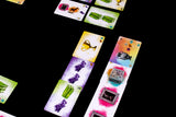 Colorful game cards with various symbols on a black background