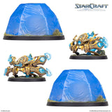 Two StarCraft game figures with blue energy effects on a white background