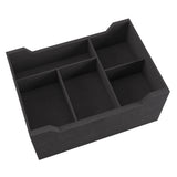 Black interior car storage compartment with divided sections on a white background