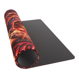 Black gaming mouse pad with a colorful rolled-up mat on a white background