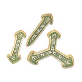 Decorative letter 'W' with green and gold design on a white background
