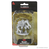 White fantasy miniature figure in clear packaging with 'Glabrezu' branding on a white background